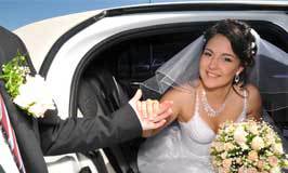 Bride exiting top hat limo